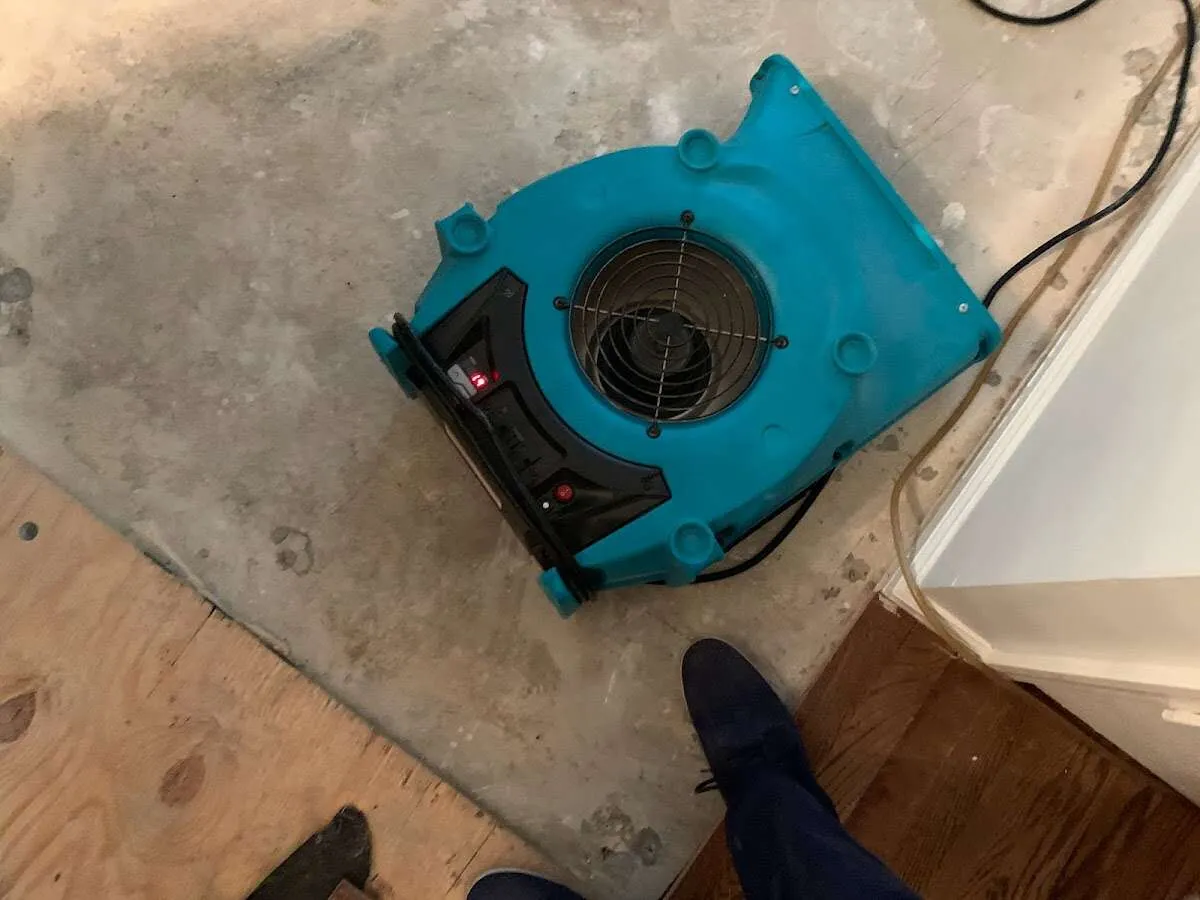 Air mover drying subfloor during Leak Detection & Repair in Chickasha